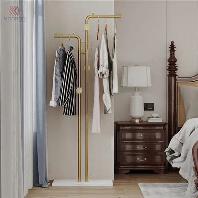 Présentoir de vêtements de vernis rotatif en métal doré de luxe, base en marbre, double face-présentoir de vêtements de vente au détail haut de gamme-extrémité